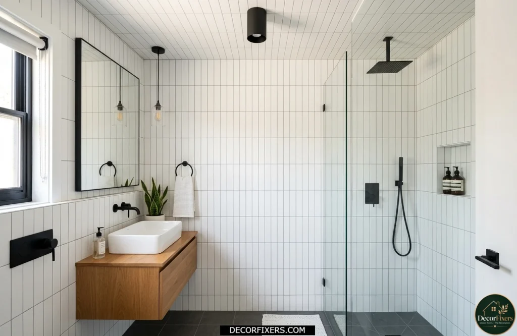Vertical subway tile layout creating the illusion of a taller bathroom